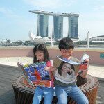 Jeth and Annika at the top of Esplanade Mall with view of Marina Bay Sands in Singapore