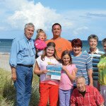Tanja and Thomas and their kids Jacqueline, Chantal and Marie with grandparents, uncle and aunt in Schuby Strand at the Baltic Sea in Germany