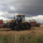 Toby and Charlotte Gardiner with their grandad, ploughing the field in Lincoln, England