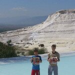 Joshua and Alexander Burger relaxing in the natural springs of Pamukkale, Turkey